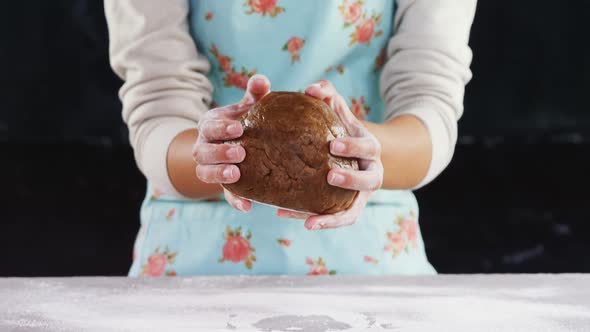 Woman molding a dough 4k