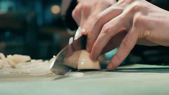 Close Up on an Onion Getting Chopped