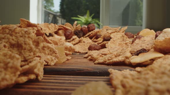 Macro Zoom in Video of Corn Flakes on Wooden Board