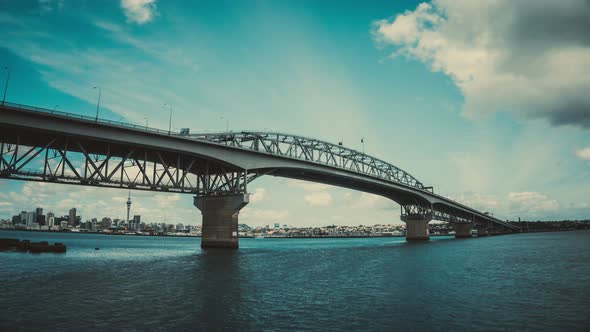 Time Lapse Auckland Harbour Bridge Reflecting on Westhaven Marina in Auckland