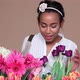 Young woman choosing flowers - VideoHive Item for Sale