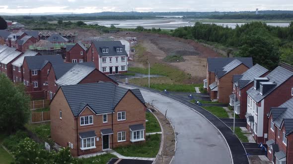 Empty real estate construction site property development aerial street view descending