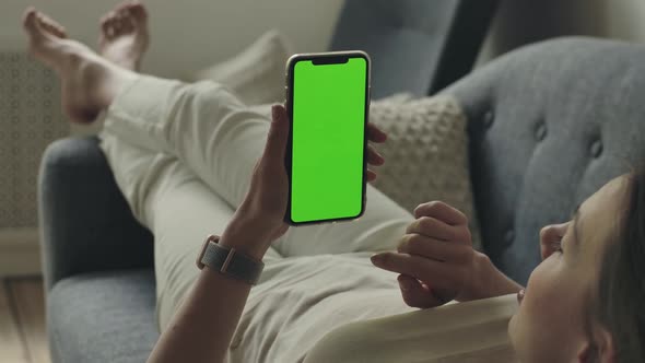 Green Empty Space on Smartphone Screen for Ads Texts Logos and Applications