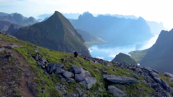 The Tourist Goes Up The Mountainside