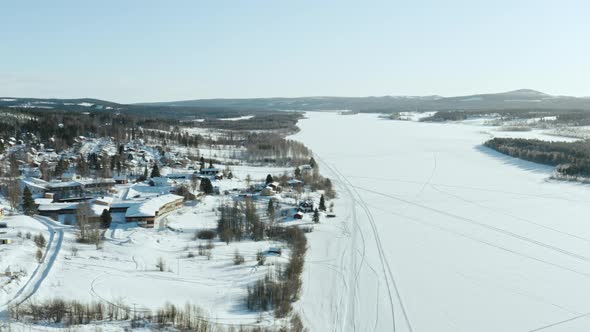 Aerial View of a Winter Village in Sweden