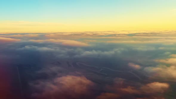 Stunning Sunset Over Floating Clouds