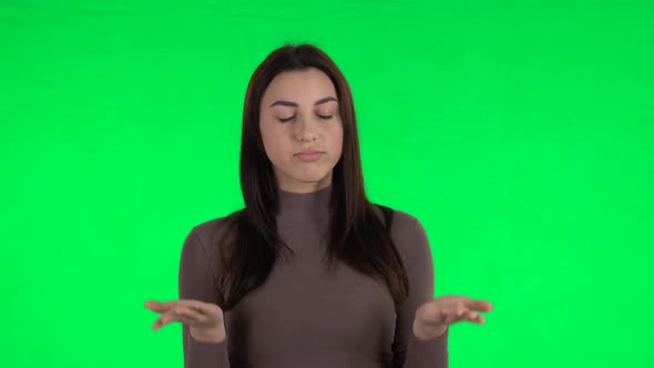 Attractive Girl Looking with Anticipation, Then Very Upset. Green Screen