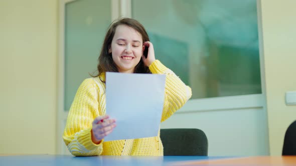 Smiling student studying at school