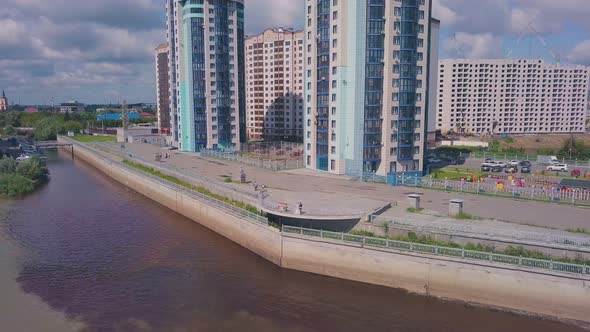 Newlywed Couple on River Bank on Sunny Day Panoramic View