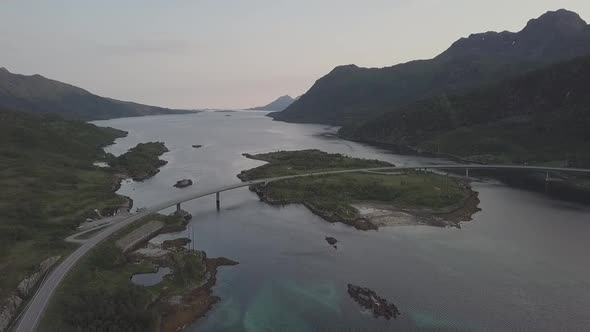 Midnight Sun in Napp, Lofoton Islands, Norway Aerial Drone 4K