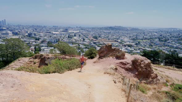 Asian Man Trail Running In San Francisco