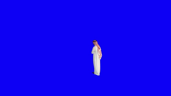 Saudi arab man walking and waiting on a blue and green screen - blue and green chroma 