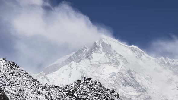 Time Lapse of Cho Oyu Peak. Blue Sky with Clouds. Himalayan Mountains. Nepal
