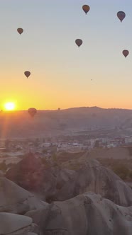 Vertical Video of Hot Air Balloons Flying in the Sky Over Cappadocia Turkey