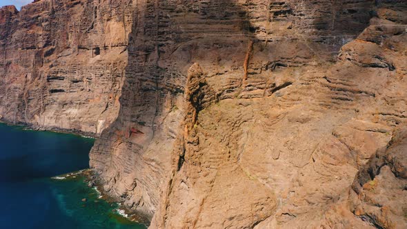 Drone Flight Along High Rock Cliffs Los Gigantes in Tenerife Island