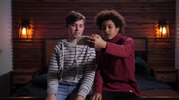 Mixed Race Friends Shooting Live Video on Phone