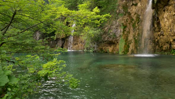 Landscape with Spring Nature of Europe, Water of Waterfalls Flowing Down Into a Transparent