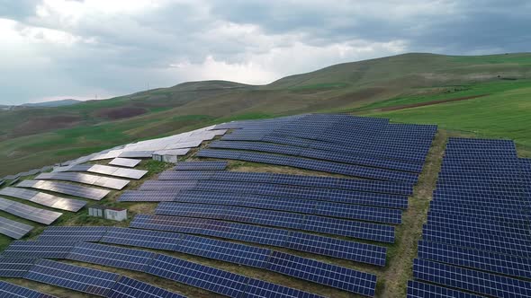 Solar Panels Around Green Fields