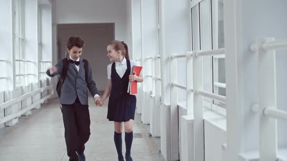 Primary School Students Holding Hands