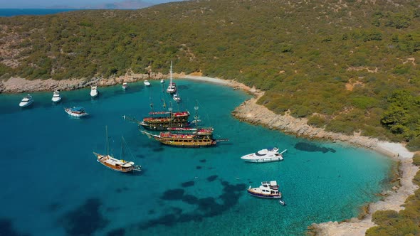 Aerial Aquarius Bay with Excursion Ships and Yachts Landmark in Bodrum Turkey