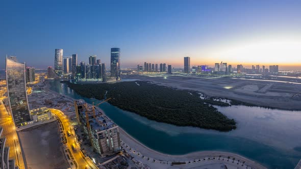 Buildings on Al Reem Island in Abu Dhabi Day to Night Timelapse From Above