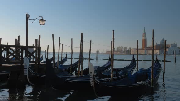 Gondola Boats with a Church in the Background