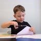 Little Boy Cutting Paper for Some Crafts - VideoHive Item for Sale