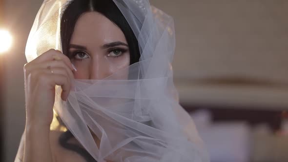 Beautiful and Lovely Bride in Night Gown and Veil, Wedding Morning, Slow Motion