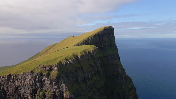 Drone Of Grass Peak Of High Sea Cliff Beinisvord