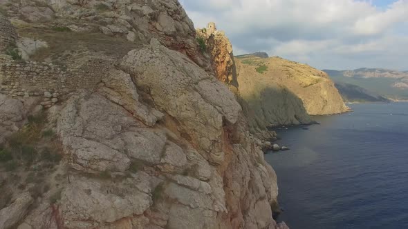 Drone View of the Steep Cliffs and the Remains of a Destroyed Fortress