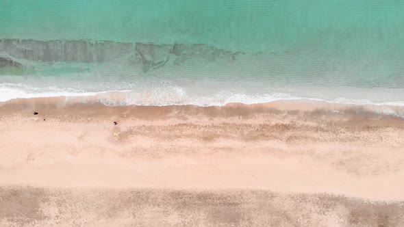 Empty beach with sea waves