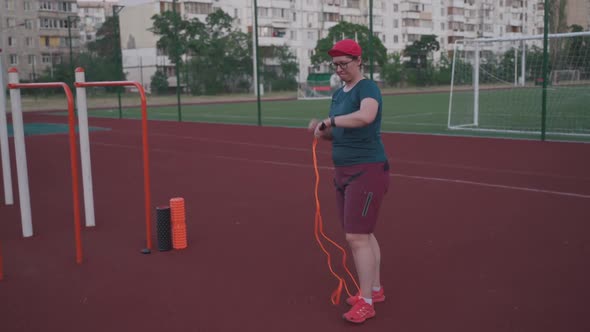 Fatty Woman with Jump Rope