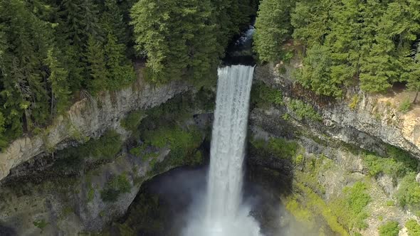 Aerial Boomerang Of Crater Waterfall With Vertigo Warp