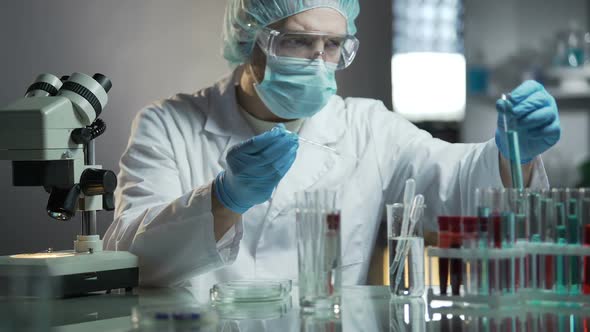Laboratory Worker Calculating Exact Formula of Hypoallergenic Cosmetic Products