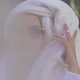 Girl in Bathrobe and Towel on Head in a City Street - VideoHive Item for Sale