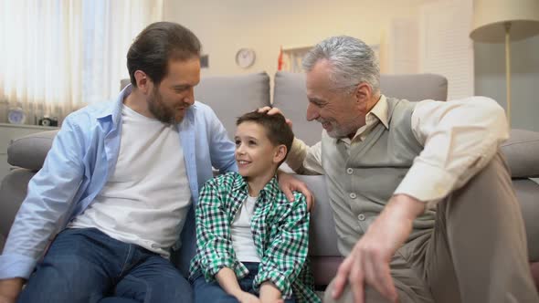 Grandpa and Dad Sharing Experience With Preteen Boy, Family Bounds, Togetherness