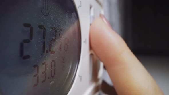 Lady Switches Off Timer on Control Panel of Microwave Oven