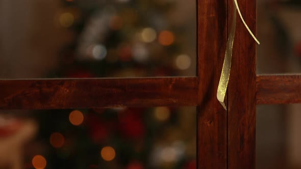 Hanging wreath and christmas decoration on door