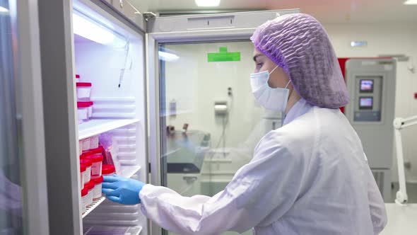 A Girl Scientist Checks a Sample for Research