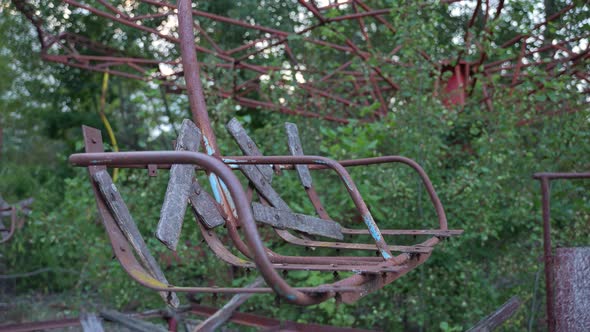 Rusty Seats of Abandoned Carousel in Pripyat