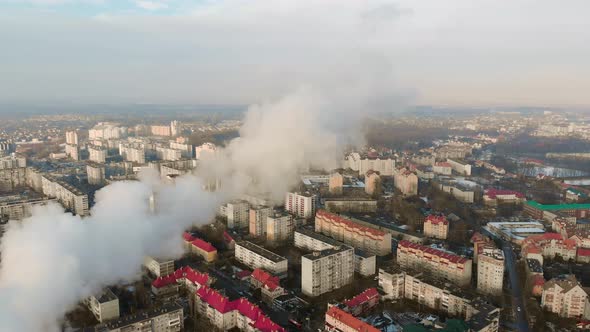 White smoke over the modern city