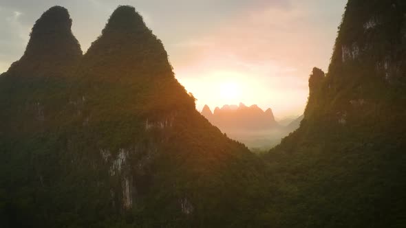 Aerial of the amazing rock formations along the Li River in China