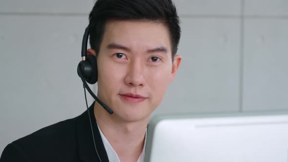 Business People Wearing Headset Working in Office