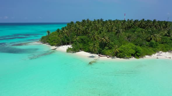 Aerial view nature of perfect coastline beach vacation by blue green ocean with white sandy backgrou