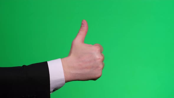 Business Man Hand Showing Thumb Up on Chromakey Screen