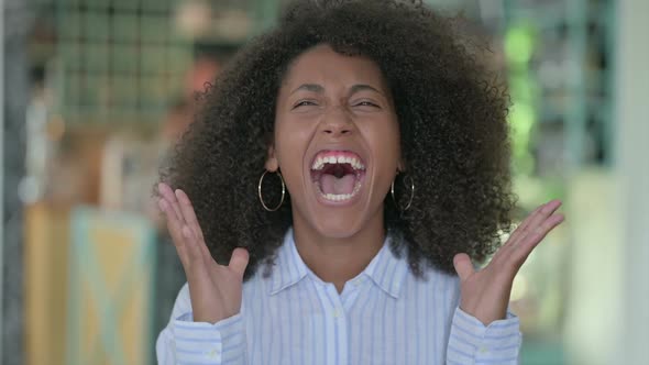 Portrait of Disappointed African Businesswoman Screaming