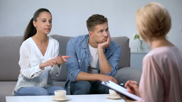 Angry Woman Blaming Husband at Psychologist Consultation, Risk of Divorce