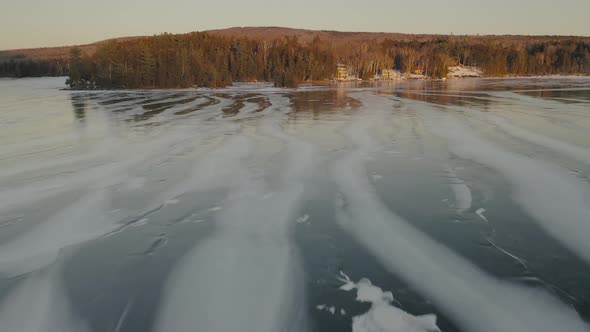 Iced Moosehead Lake. Maine. USA. Aerial high speed low level flight