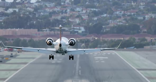 Cinematic Close Up Back View on Landing Airplane