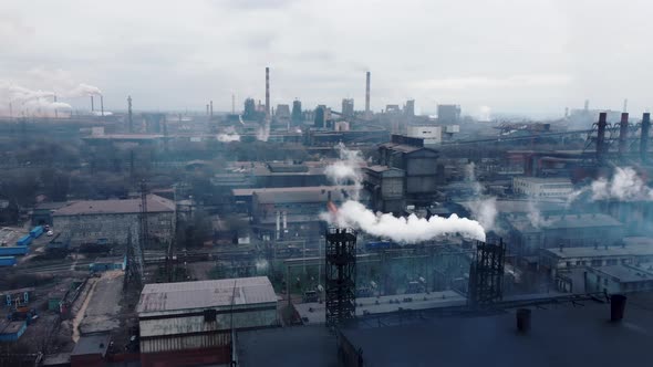 aerial view on heavy industry with air pollution produced by a large factory. climate change
